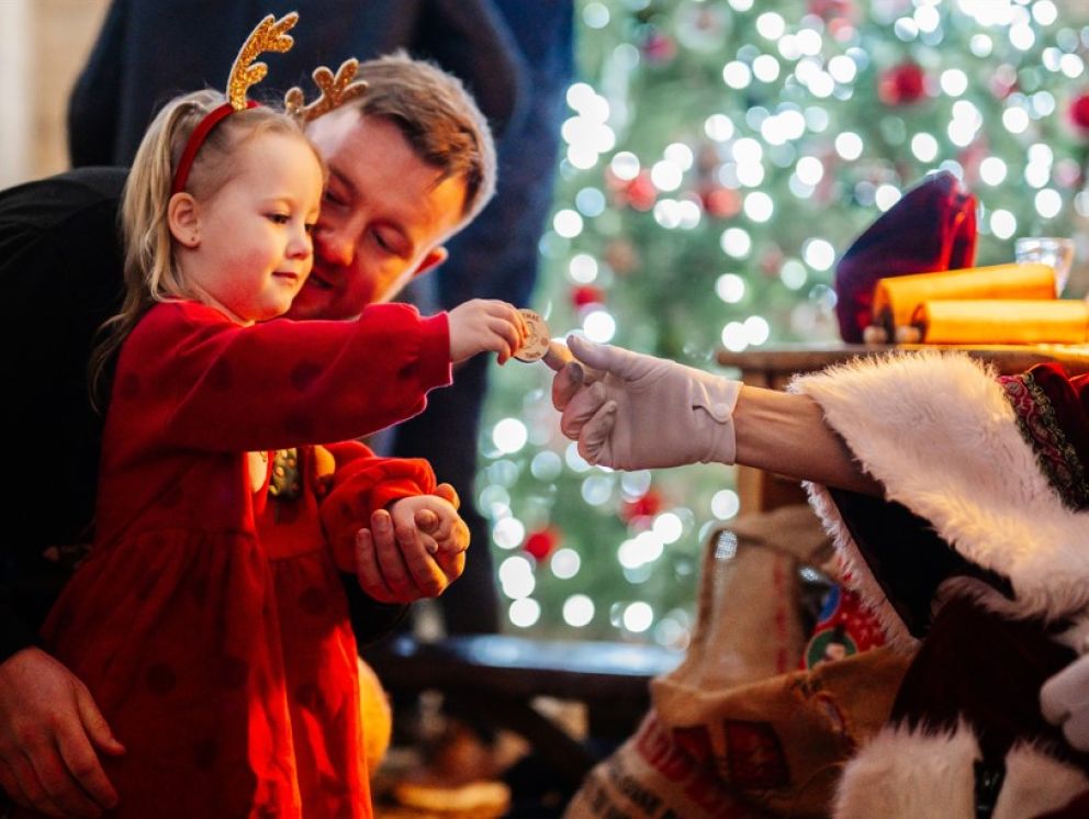 little girl with father christmas