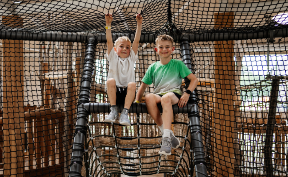 two boys on climbing nets
