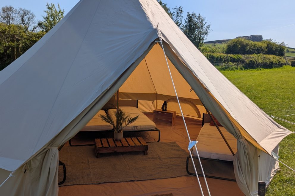 Family enjoying camping at William's Den, a family campsite in Yorkshire with spacious pitches and adventure play.