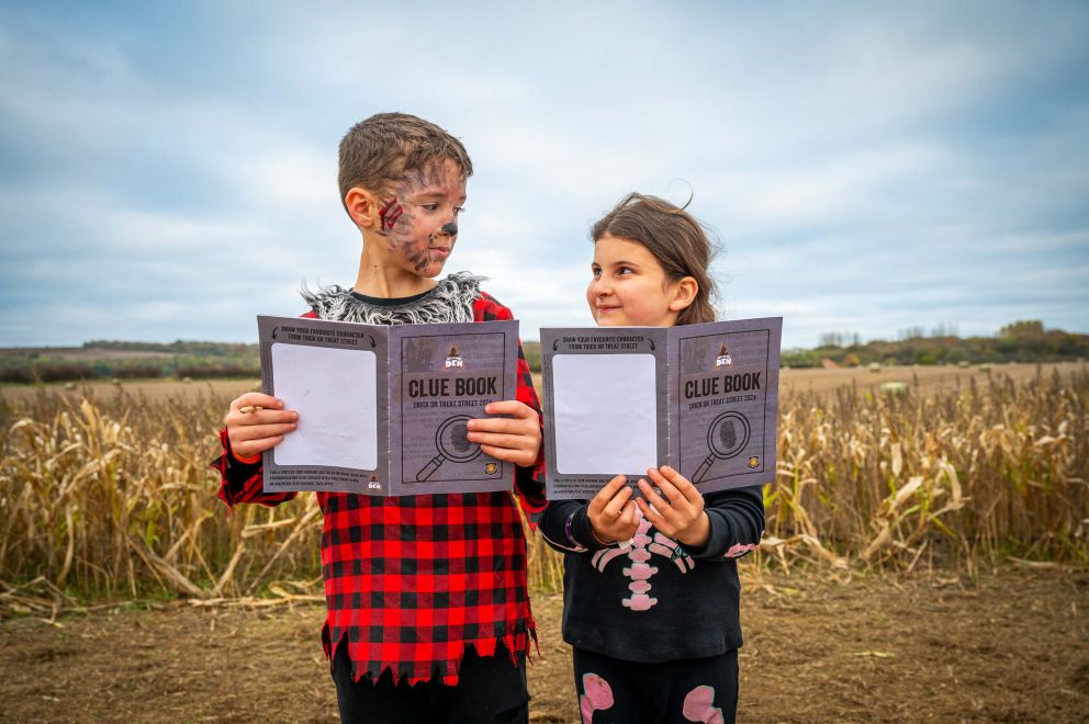 boy and girl with their detective books